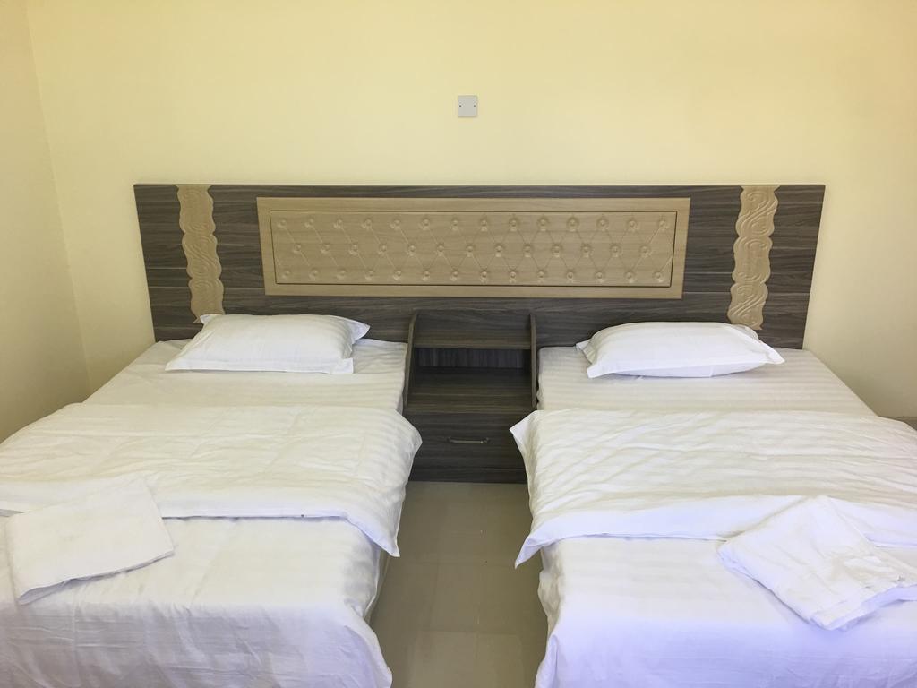 Stone Guest House Al 'Aqar Екстериор снимка